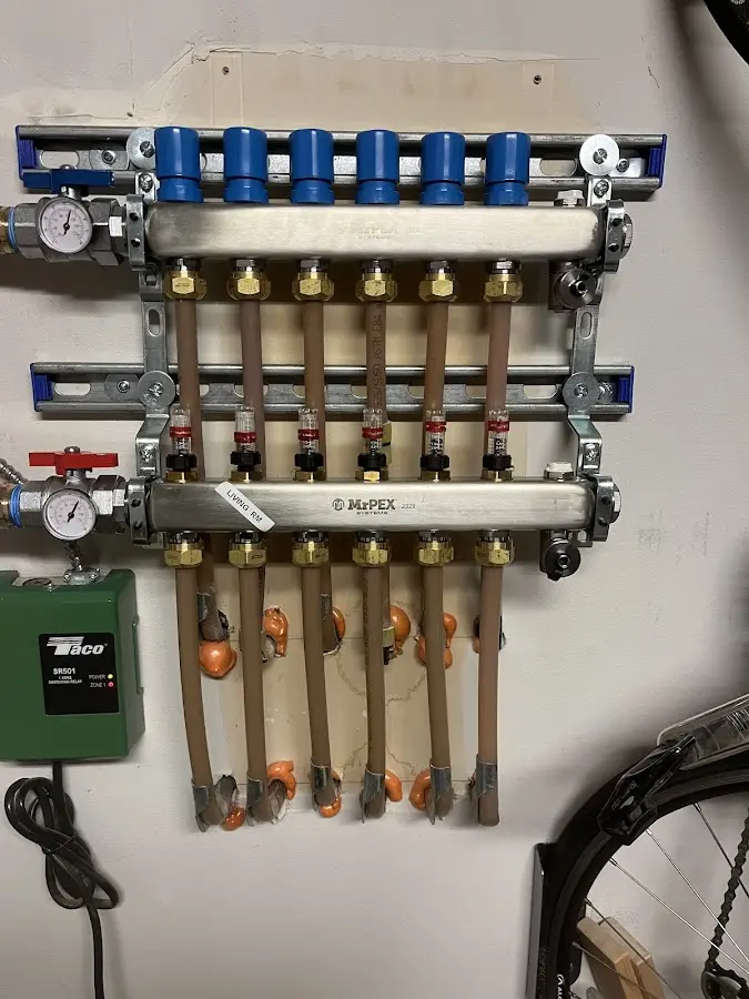 Plumber performing Leak Detection at a residential property in Little Compton